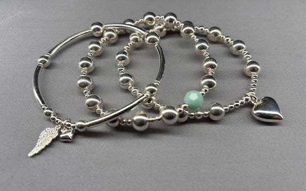 Sterling Silver 3mm 4mm and 8mm bead bracelet with medium heart charm