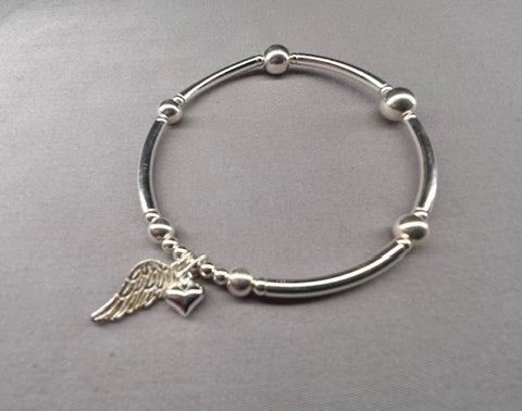 Sterling silver noodle bracelet angel wing charm with tiny heart