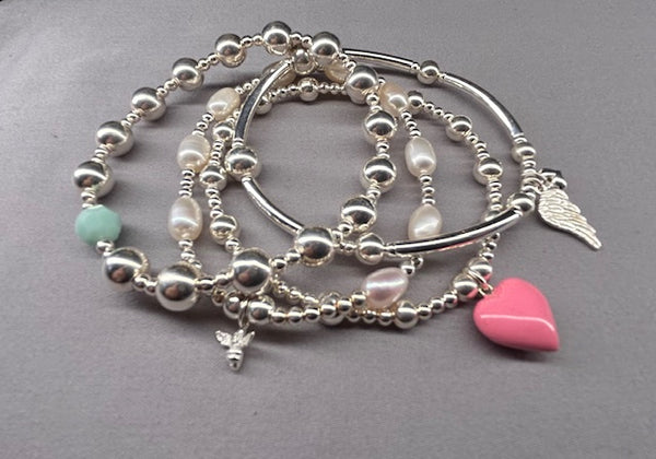 Sterling silver noodle bracelet angel wing charm with tiny heart