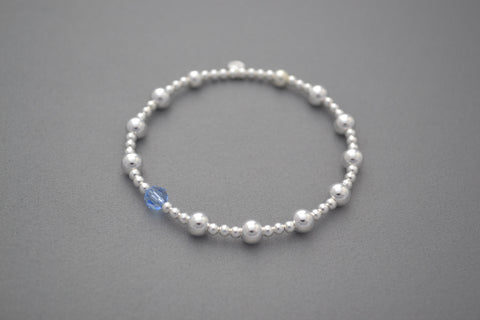 Sterling Silver small and medium ball bead bracelet with blue Swarovski crystal