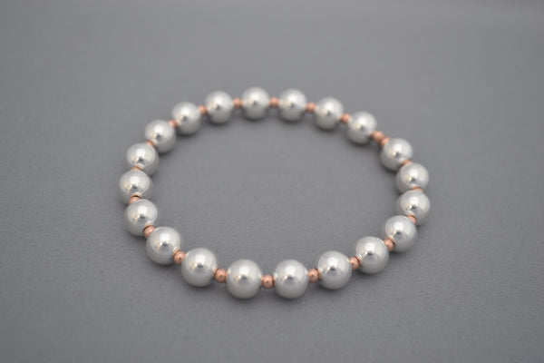 Rose Gold small ball and large Sterling Silver bead bracelet