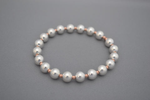 Rose Gold small ball and large Sterling Silver bead bracelet