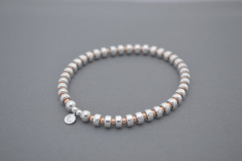 Designed by Alisa Signature Sterling Silver disc and Rose Gold bead bracelet
