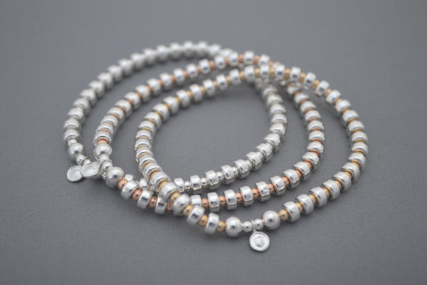 Designed by Alisa Signature Sterling Silver disc and Gold bead bracelet