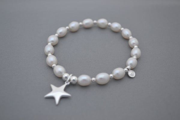 Freshwater pearl and Sterling Silver bead bracelet with puff star charm