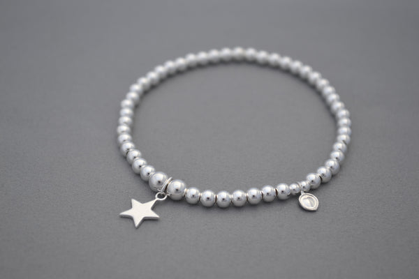 Sterling Silver 4mm bead bracelet with flat star charm