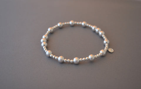 Sterling Silver small and medium three large bead bracelet