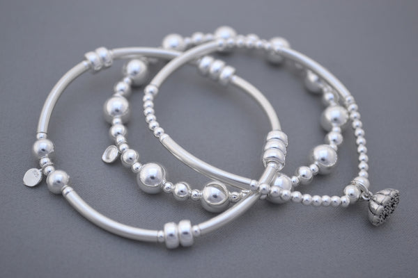 Designed by Alisa Signature Sterling Silver noodle and Silver disc bead bracelet