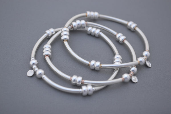 Designed by Alisa Signature Sterling Silver noodle and Silver disc bead bracelet