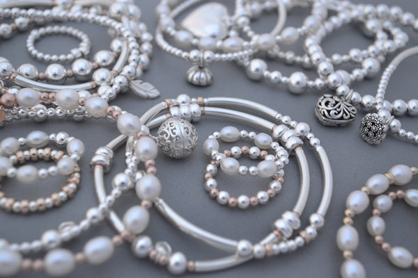 Sterling Silver noodle mixed with Rose Gold and Silver disc bead bracelet