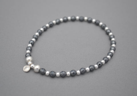 Designed by Alisa Hematite 4mm faceted and Sterling Silver mixed bead bracelet