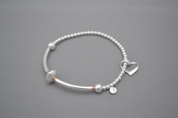 Sterling Silver noodle and small Rose Gold bead bracelet with open heart charm
