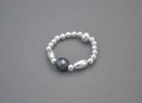 Sterling Silver rice bead ring with faceted Hematite round bead charm