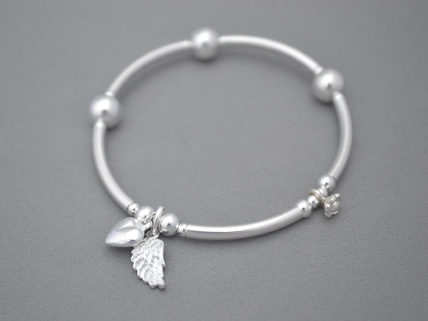 Sterling Silver noodle and bead bracelet with Angel wing and puff heart charms