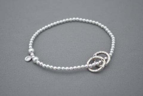 925 Sterling Silver handmade 3mm and 5mm bead bracelet with two handmade ring charms