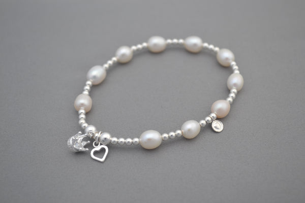 Sterling Silver and Freshwater Pearl bead bracelet with Heart and Crown charms